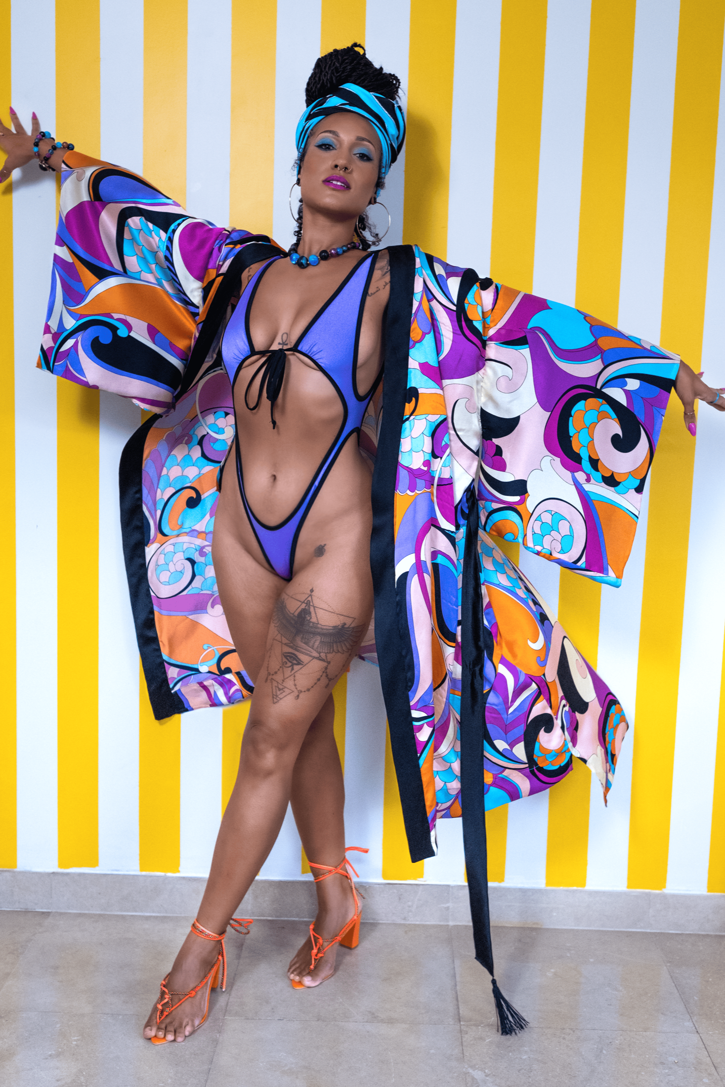 Woman in a colorful outfit with a vibrant background